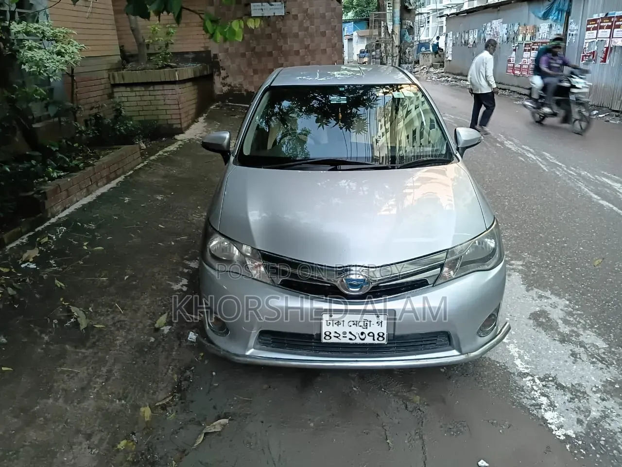 টয়োটা অ্যাক্সিও ১.৫ হাইব্রিড জি ২ডব্লিউডি ২০১৩ সিলভার