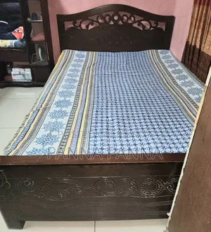 Malaysian Woodcut Bed. Very Good Condition. 5 Feet by 6 Feet