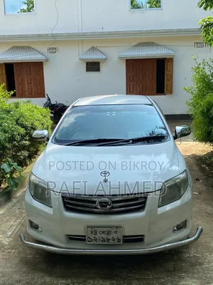 টয়োটা অ্যাক্সিও ১.৫ জি টু হুইল ড্রাইভ ২০০৯ হোয়াইট