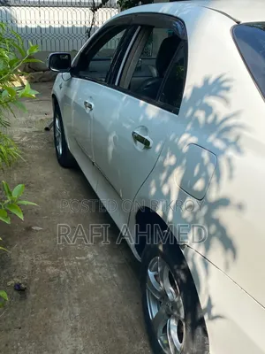 টয়োটা অ্যাক্সিও ১.৫ জি টু হুইল ড্রাইভ ২০০৯ হোয়াইট