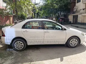 টয়োটা করোলা সেডান ২০০৩ সাদা