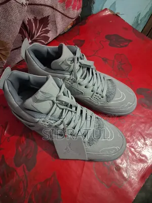 Air Jordan 4 KAWS