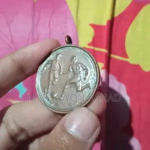 An old 19th-century metal locket/medallion