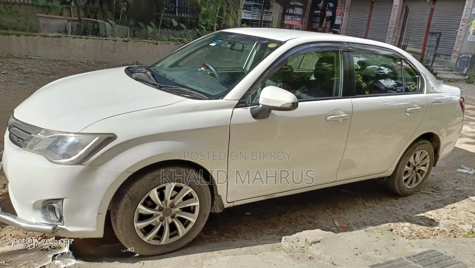 টয়োটা অ্যাক্সিও ১.৫ এক্স টু হুইল ড্রাইভ ২০১৩ সাদা