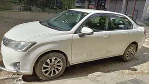 টয়োটা অ্যাক্সিও ১.৫ এক্স টু হুইল ড্রাইভ ২০১৩ সাদা