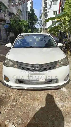 টয়োটা অ্যাক্সিও ১.৫ এক্স টু হুইল ড্রাইভ ২০১৩ সাদা