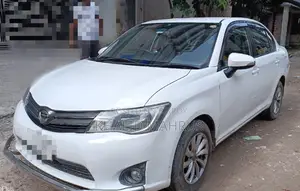 টয়োটা অ্যাক্সিও ১.৫ এক্স টু হুইল ড্রাইভ ২০১৩ সাদা