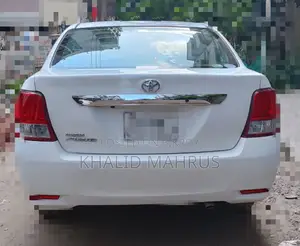 টয়োটা অ্যাক্সিও ১.৫ এক্স টু হুইল ড্রাইভ ২০১৩ সাদা