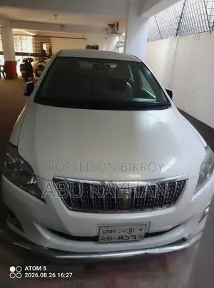 টয়োটা প্রমিও ২০১০ পার্ল হোয়াইট