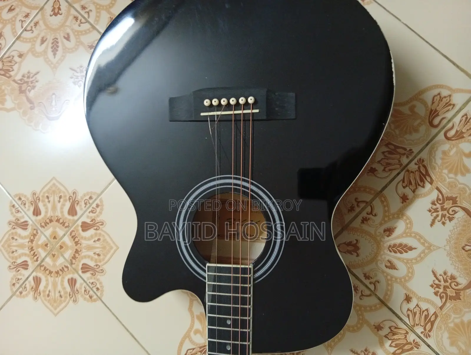 এক্স - অ্যাকোস্টিক গিটার
