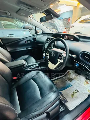 Toyota Prius 4dr Hatchback (1.8L 4cyl gas/electric hybrid CVT) 2016 Red