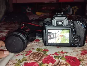 Canon EOS 70D With 18-135mm Zooming Lense and 50mm Prime Lense, Bag