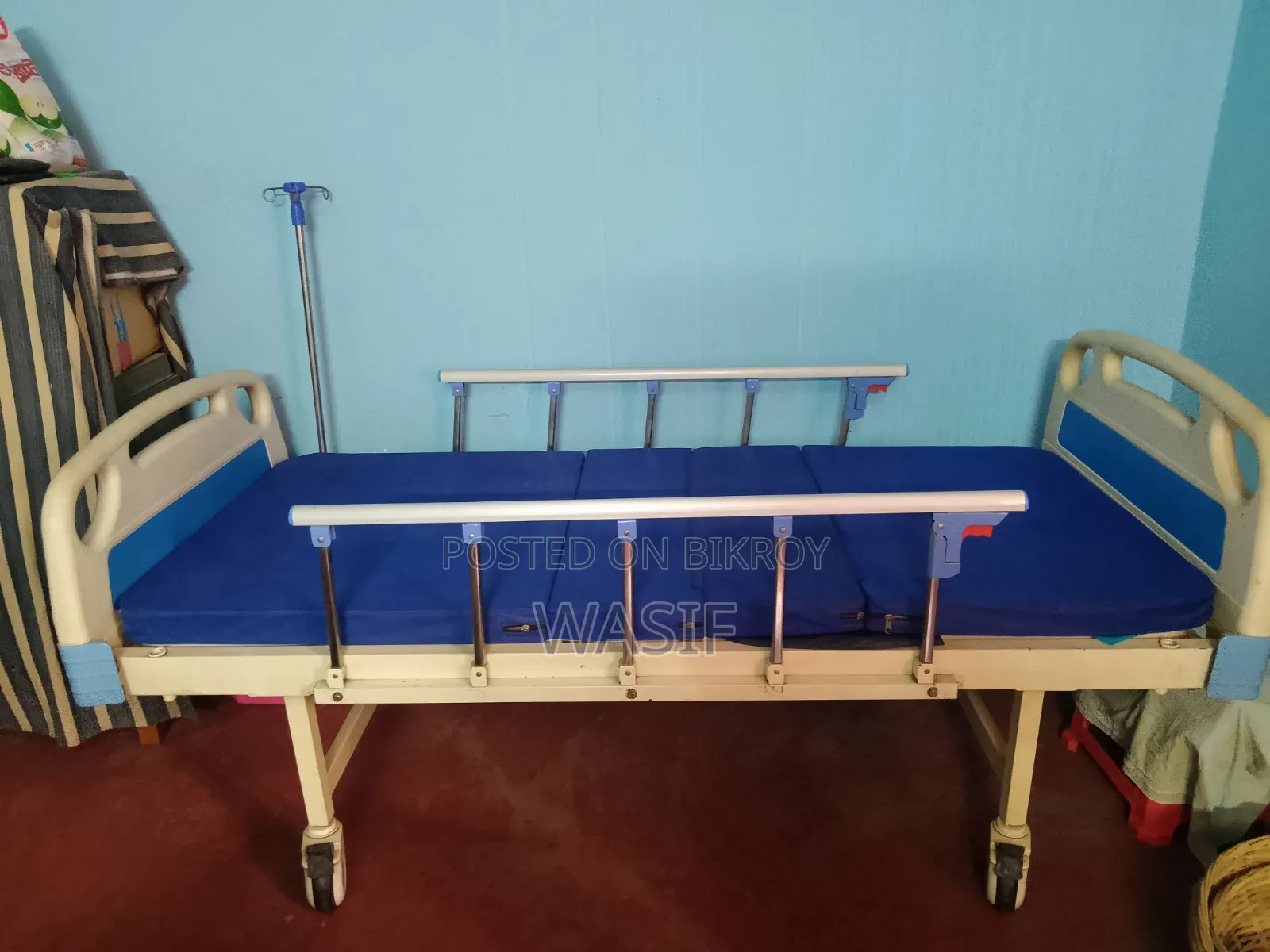 Medical bed with manual control for sale.