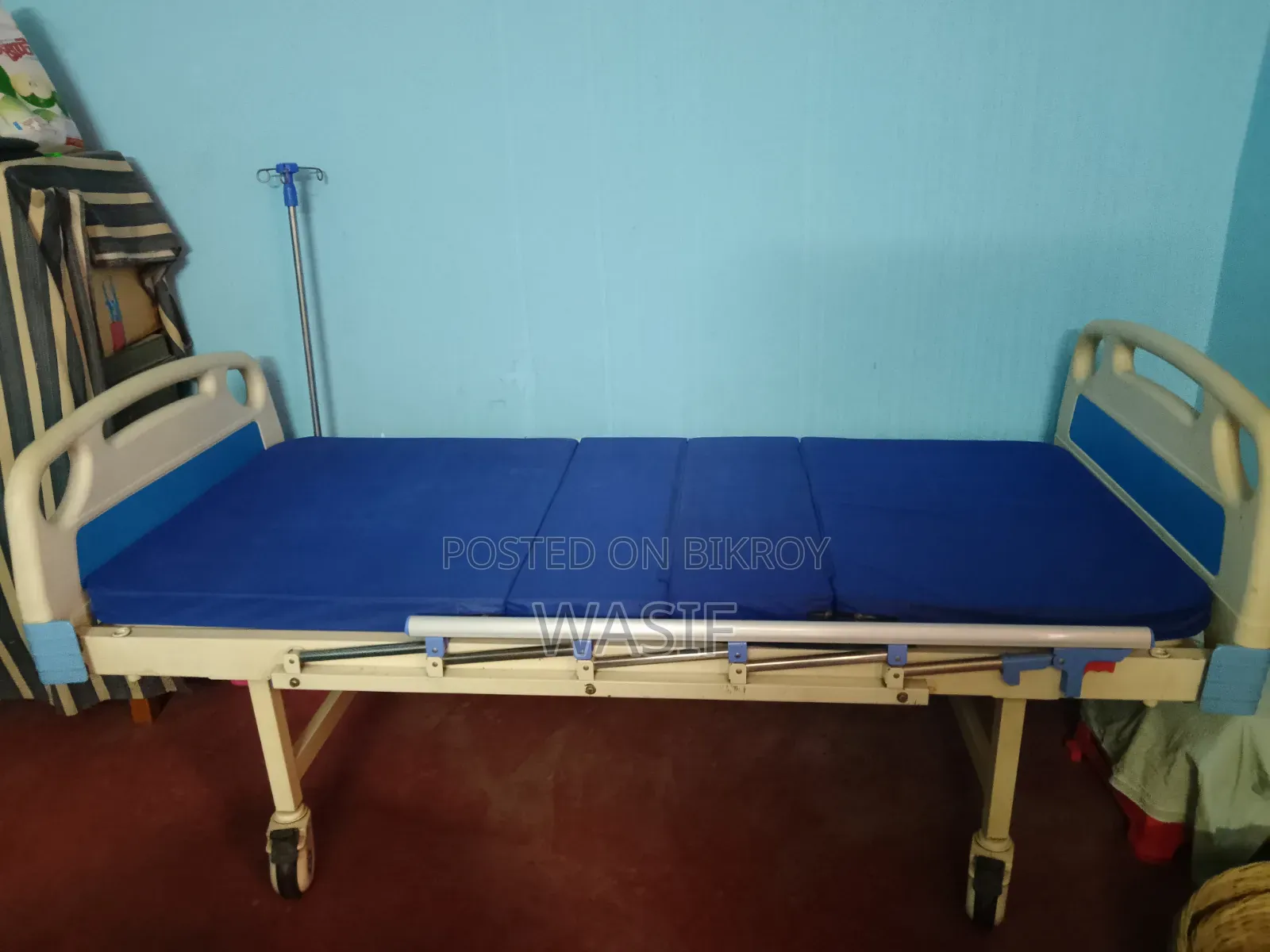Medical bed with manual control for sale.