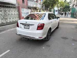 টয়োটা অ্যাক্সিও ১.৫ জি টুডব্লিউডি ২০১৫ সাদা