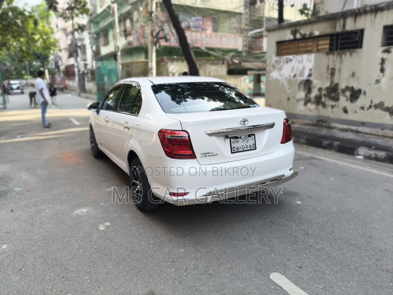 টয়োটা অ্যাক্সিও ১.৫ জি টুডব্লিউডি ২০১৫ সাদা