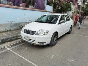 টয়োটা করোল্লা ২০০৩ সাদা