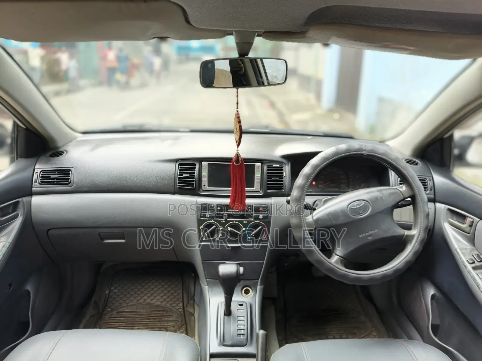 টয়োটা করোল্লা ২০০৩ সাদা