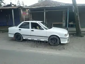 নিসান সানি ১৯৯০ হোয়াইট