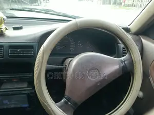 নিসান সানি ১৯৯০ হোয়াইট