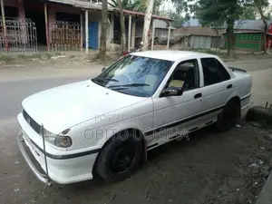 নিসান সানি ১৯৯০ হোয়াইট