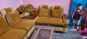 Corner Sofa, Tea Table Wall Showcase