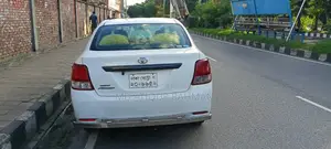 টয়োটা এক্সিও ২০১২ সাদা