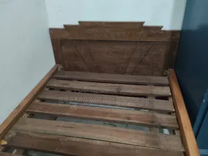 Wooden Bed. Length 6 feet 8 inches. Width 3 feet.