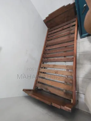 Wooden Bed. Length 6 feet 8 inches. Width 3 feet.