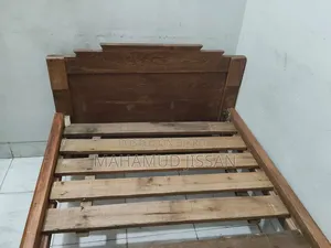 Wooden Bed. Length 6 feet 8 inches. Width 3 feet.