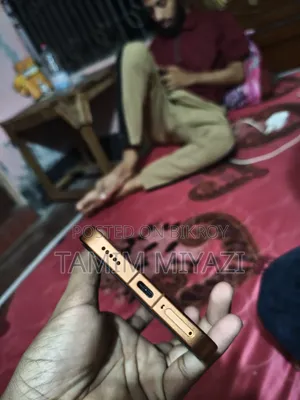 নতুন শাওমি রেডমি টার্বো ৫ ম্যাক্স ২৫৬ জিবি কমলা