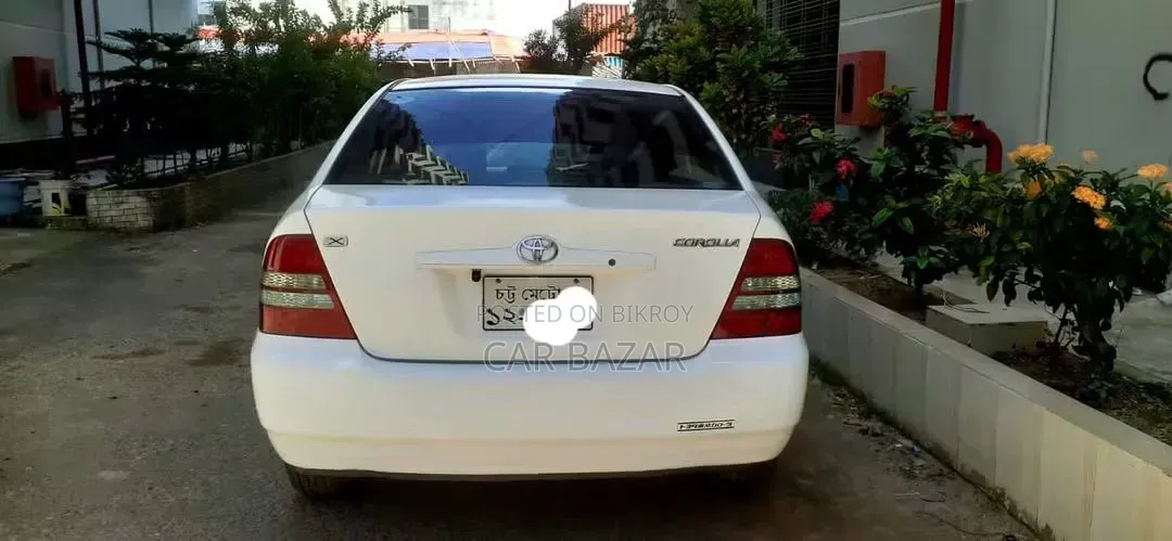 টয়োটা করোল্লা সেডান অটোমেটিক ২০০৪ সাদা