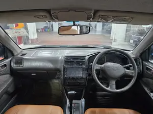 Toyota Carina 1.5 Front-Wheel Drive Sedan 1997 Red
