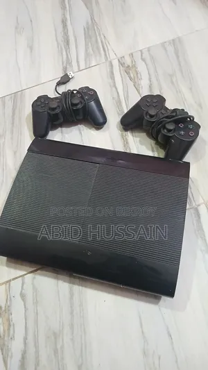 PS3 Slim | PlayStation 3 Slim (With 14 CDs and 2 Controllers)