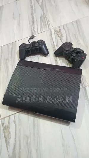 PS3 Slim | PlayStation 3 Slim (With 14 CDs and 2 Controllers)