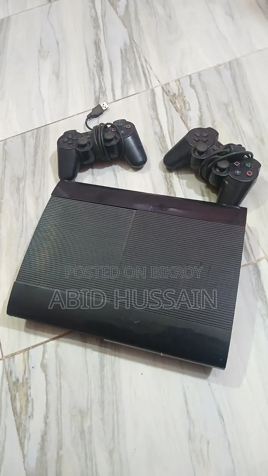 PS3 Slim | PlayStation 3 Slim (With 14 CDs and 2 Controllers)