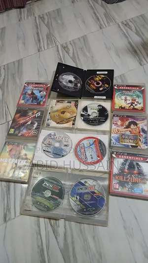 PS3 Slim | PlayStation 3 Slim (With 14 CDs and 2 Controllers)