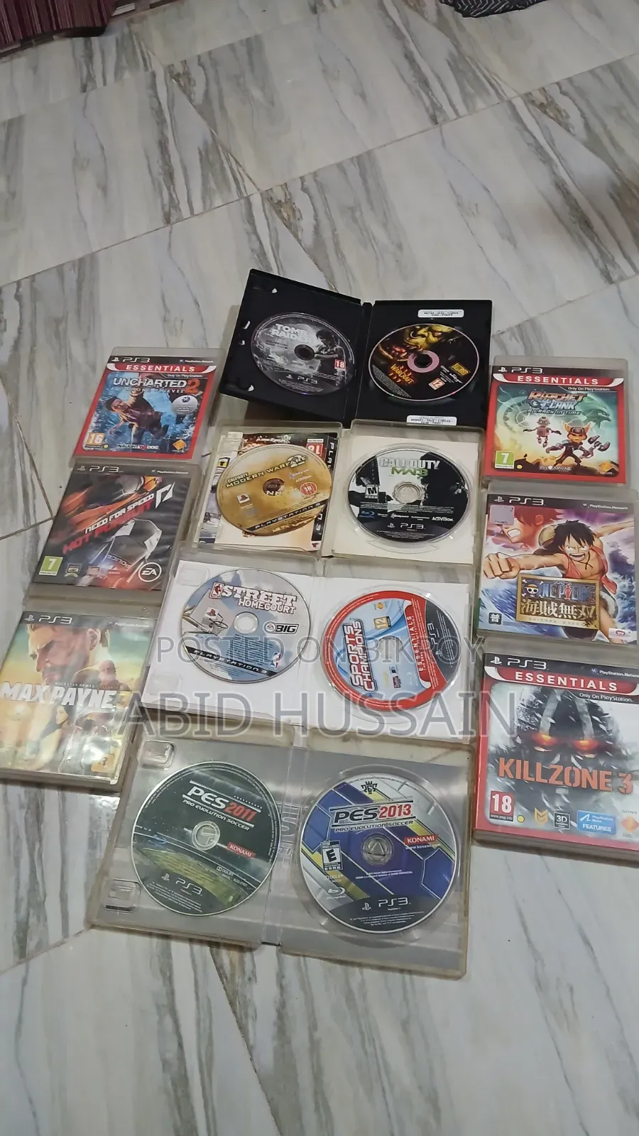 PS3 Slim | PlayStation 3 Slim (With 14 CDs and 2 Controllers)