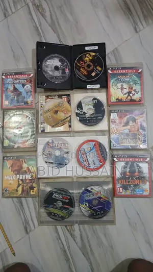 PS3 Slim | PlayStation 3 Slim (With 14 CDs and 2 Controllers)
