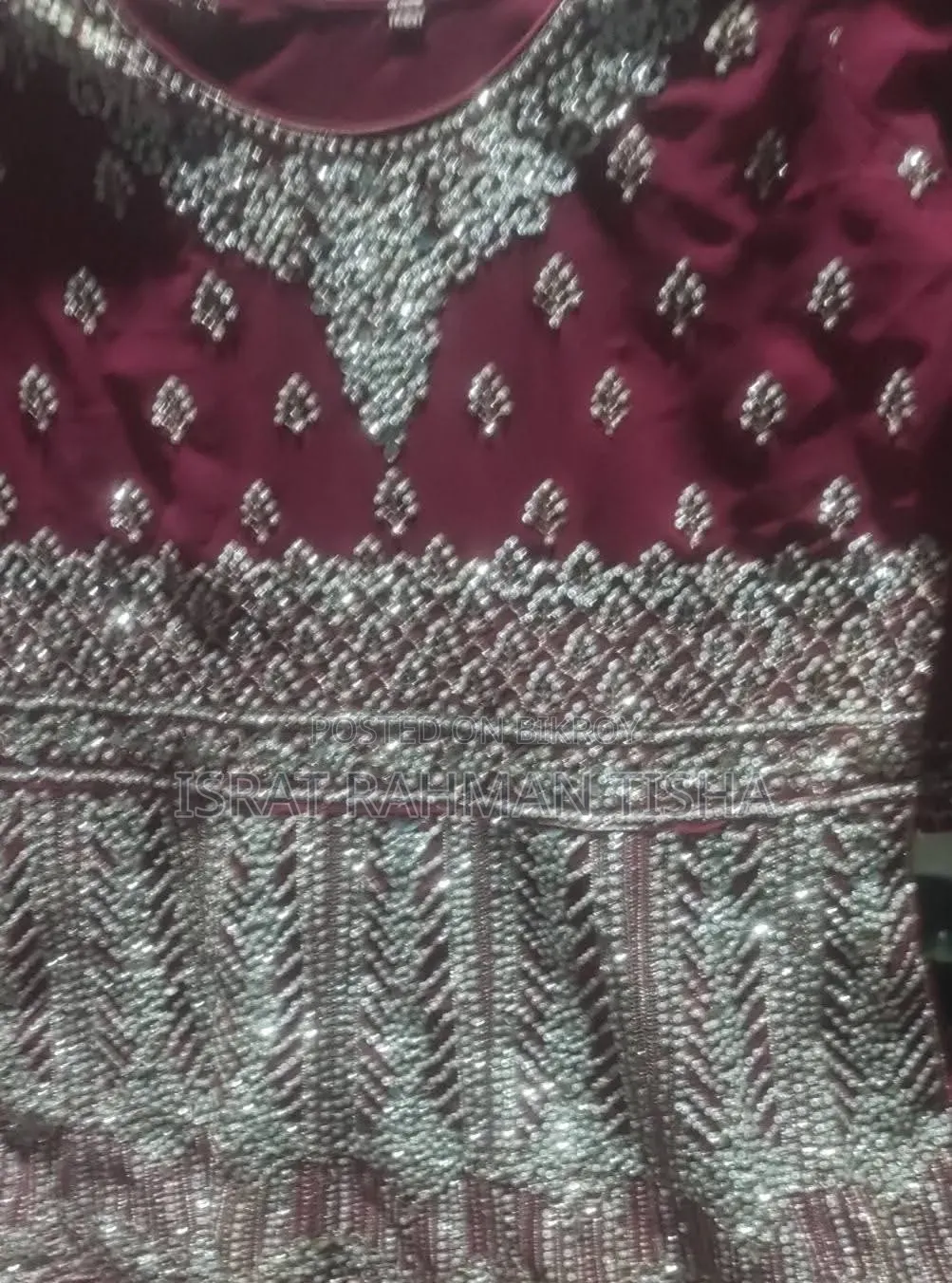 I will sell a beautiful maroon colored gown dress to you