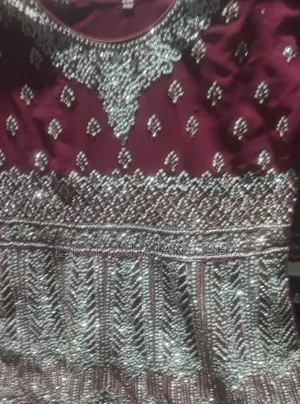 I will sell a beautiful maroon colored gown dress to you