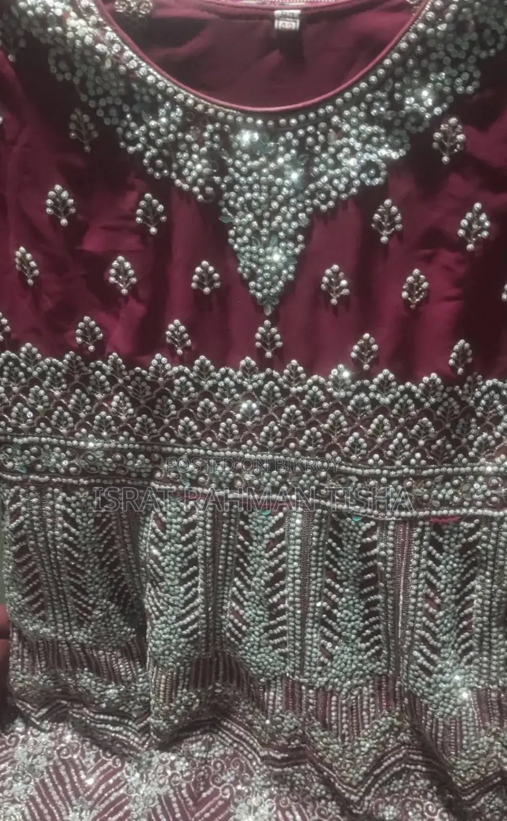 I will sell a beautiful maroon colored gown dress to you