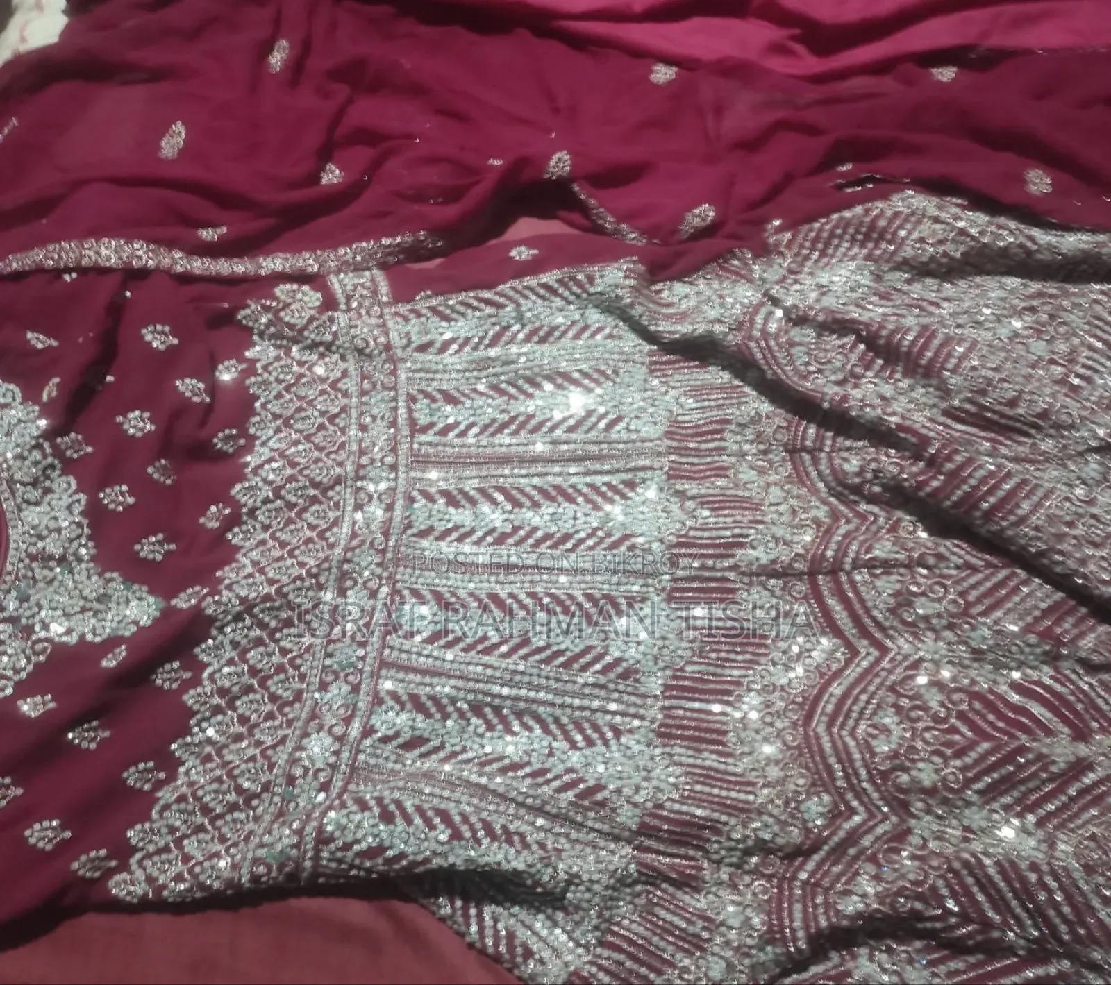 I will sell a beautiful maroon colored gown dress to you
