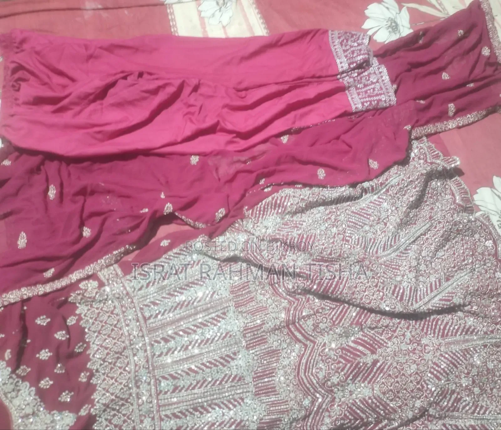 I will sell a beautiful maroon colored gown dress to you