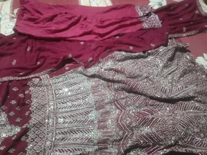 I will sell a beautiful maroon colored gown dress to you