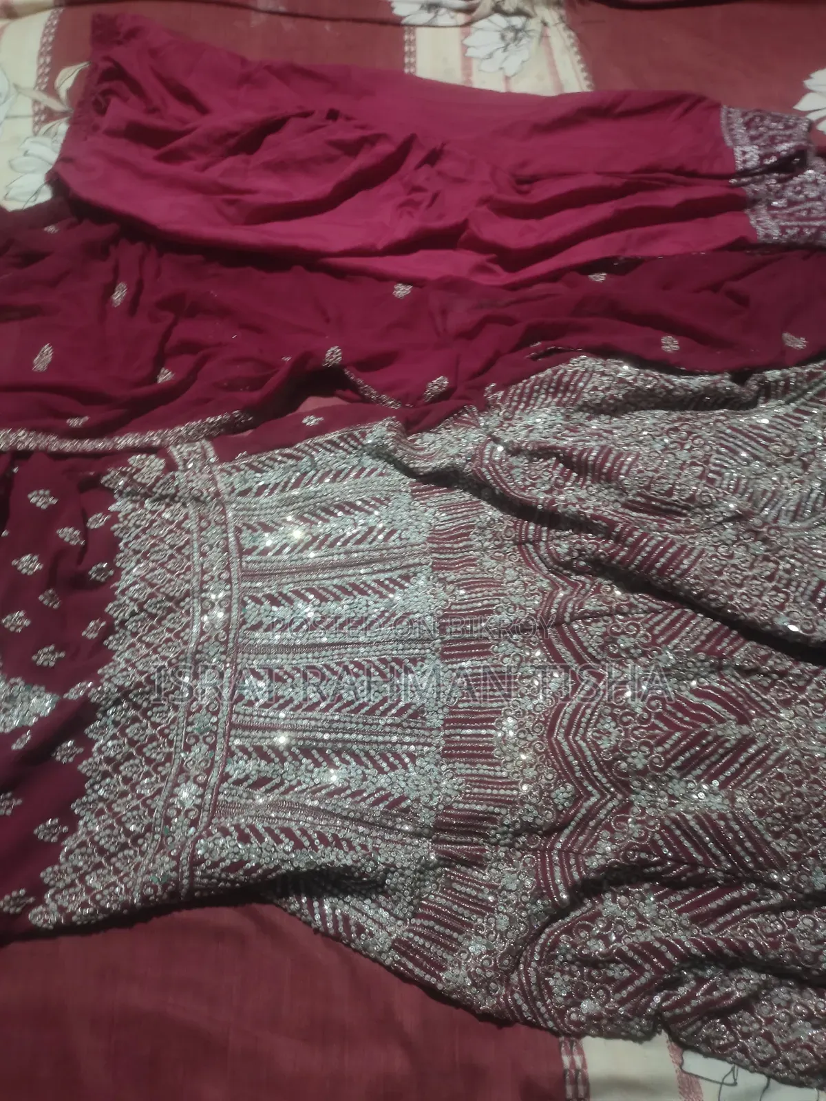 I will sell a beautiful maroon colored gown dress to you