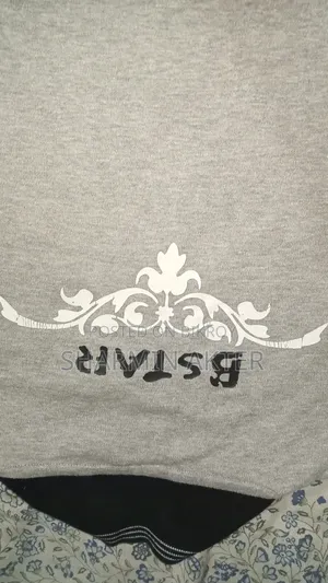 Winter sweaters and thick t-shirts for sale.