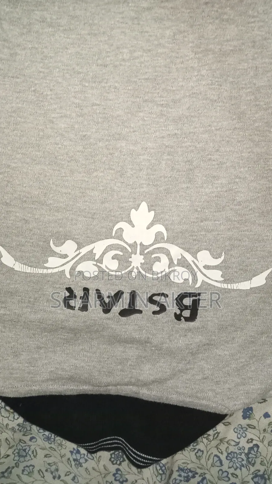 Winter sweaters and thick t-shirts for sale.