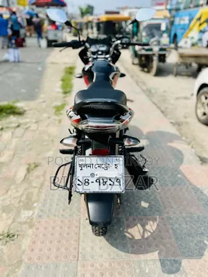 বাজাজ ডিসকভার ১১০ ২০২৩ লাল