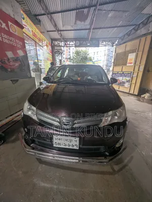 টয়োটা অ্যাক্সিও ২০১৩ মেরুন